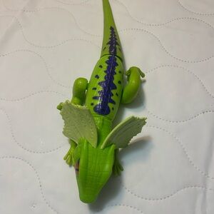 Green and Purple Reptile Action Figure